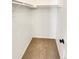 Walk-in closet with neutral carpeting and door to enter at 5966 S Winnipeg St, Aurora, CO 80015