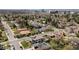 This house is located in a suburban area with other large homes and mature trees at 5455 E Cedar Ave, Denver, CO 80246