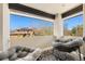 Cozy balcony with comfortable seating and a view of the neighborhood at 5455 E Cedar Ave, Denver, CO 80246