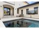 Backyard patio with pool featuring tiled accents, comfortable seating and an outdoor space at 5455 E Cedar Ave, Denver, CO 80246