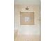 Neutral shower features a rain shower head, built-in niche, and glass enclosure at 5455 E Cedar Ave, Denver, CO 80246