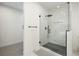 Contemporary bathroom featuring a sleek glass shower and modern hardware at 7079 S Locust Pl, Centennial, CO 80112