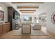 Spacious living room with a fireplace and large windows offering scenic views at 7079 S Locust Pl, Centennial, CO 80112