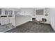 Functional laundry room with modern machines, neutral paint, and comfortable seating at 6930 E Girard Ave # 106, Denver, CO 80224