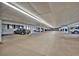 Parking garage for residents, with ample spaces and well-lit interiors at 6930 E Girard Ave # 106, Denver, CO 80224