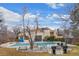Outdoor pool area with lounge chairs, picnic tables, and barbecue grills for residents enjoyment at 6930 E Girard Ave # 106, Denver, CO 80224