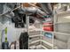 Exposed basement storage with shelving, perfect for organizing your belongings at 4827 Meade St, Denver, CO 80221