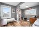 Welcoming entryway with natural light, stylish decor, and practical storage solutions at 4827 Meade St, Denver, CO 80221