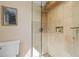 Elegant glass shower with custom tile work and built-in niche for toiletries at 24030 San Isabel Rd, Indian Hills, CO 80454