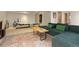 Spacious living room with entertainment center and workout area at 24030 San Isabel Rd, Indian Hills, CO 80454