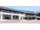 A commercial building featuring a variety of businesses, including retail and food establishments at 181 S Monaco Pkwy, Denver, CO 80224