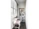 Compact dressing room with a transparent vanity, mirror, and lighting for a stylish space at 181 S Monaco Pkwy, Denver, CO 80224