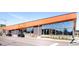 A modern retail building with expansive windows, providing excellent visibility for businesses at 181 S Monaco Pkwy, Denver, CO 80224