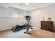 Basement gym featuring exercise equipment, including a stationary bike and a rowing machine at 2990 S Jay St, Denver, CO 80227