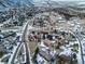 Aerial view of neighborhood with houses and roads at 10895 Pheasant Run, Littleton, CO 80125