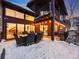 Deck with outdoor furniture and mountain views at sunset at 10895 Pheasant Run, Littleton, CO 80125