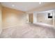 Spacious carpeted bedroom with recessed lighting and a bright, inviting ambiance at 10895 Pheasant Run, Littleton, CO 80125