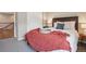 Inviting bedroom with natural light, closet and neutral walls at 1557 S Dallas Cir, Denver, CO 80247