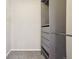 Walk-in closet with built-in shelving and ample hanging space for organized storage and convenience at 1557 S Dallas Cir, Denver, CO 80247