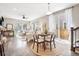 Bright living room with hardwood floors, neutral decor, and ample natural light at 1557 S Dallas Cir, Denver, CO 80247