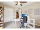 Functional home office setup with a desk, chair, and additional storage solutions at 1557 S Dallas Cir, Denver, CO 80247