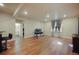 Spacious finished basement with hardwood floors, a bar area, and a separate office space at 10003 Atlanta St, Parker, CO 80134