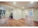 Finished basement area featuring hardwood floors and plenty of open space for entertaining and relaxing at 10003 Atlanta St, Parker, CO 80134