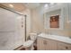 Bright bathroom features a walk-in shower with modern fixtures and a stylish vanity at 10003 Atlanta St, Parker, CO 80134