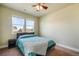 Bedroom with two bright windows offering neighborhood views at 10003 Atlanta St, Parker, CO 80134