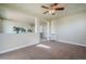 Cozy bonus room featuring neutral tones, with a view of the staircase and an adjacent hallway at 10003 Atlanta St, Parker, CO 80134