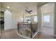 Upstairs landing with laundry area and plenty of natural light at 10003 Atlanta St, Parker, CO 80134