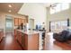 Bright kitchen with stainless steel appliances, granite countertops, and hardwood flooring at 10003 Atlanta St, Parker, CO 80134