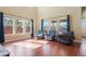 Bright living room with large windows and hardwood floors at 10003 Atlanta St, Parker, CO 80134