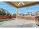 Covered patio offering an outdoor space for dining and entertaining, with views of the yard at 10003 Atlanta St, Parker, CO 80134