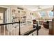 Upstairs loft area with built-in shelving and seating area at 7956 S Eudora Cir, Centennial, CO 80122