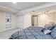 Spacious bedroom with built in shelves and a walk in closet at 11418 W Roxbury Ave, Littleton, CO 80127