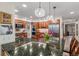 A gourmet kitchen showcasing dark granite countertops, wood cabinets, and stainless steel appliances at 11418 W Roxbury Ave, Littleton, CO 80127