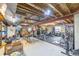 Large unfinished basement space with gym equipment and storage areas, ready for customization at 11801 E 118Th Ave, Commerce City, CO 80640