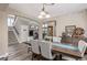 Elegant dining room with seating for six and access to the living room at 11801 E 118Th Ave, Commerce City, CO 80640