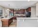 Spacious kitchen with stainless steel appliances and granite countertops at 11801 E 118Th Ave, Commerce City, CO 80640