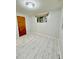 Simple bedroom with luxury vinyl plank flooring and a window at 3231 S Galapago St, Englewood, CO 80110
