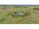 Sprawling backyard oasis with a sparkling pool, patio, and well-maintained landscaping at 330 N Rocky Cliff Trl, Franktown, CO 80016