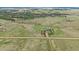 Expansive acreage with scattered trees and a home featuring an attached three car garage at 330 N Rocky Cliff Trl, Franktown, CO 80016