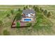 Beautifully landscaped backyard with a refreshing pool and patio area, great for entertaining at 330 N Rocky Cliff Trl, Franktown, CO 80016
