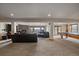 Finished basement includes a large seating area with a fireplace and a pool table at 330 N Rocky Cliff Trl, Franktown, CO 80016