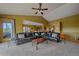 Spacious living area featuring an open layout and easy access to other living spaces in the home at 330 N Rocky Cliff Trl, Franktown, CO 80016