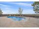 Inviting pool surrounded by a lush yard, with lounge chairs for relaxing and enjoying the sunshine at 330 N Rocky Cliff Trl, Franktown, CO 80016