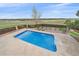Sparkling pool surrounded by a well-maintained yard, perfect for summer fun and relaxation at 330 N Rocky Cliff Trl, Franktown, CO 80016