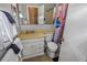 Cozy bathroom featuring a vanity, toilet, and shower with colorful curtain at 3071 S Jasmine St, Denver, CO 80222