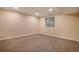 Basement with carpet flooring and one window at 21710 Silver Meadow Ln, Parker, CO 80138
